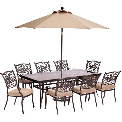 Hanover Traditions 9 Piece Bronze Patio Dining Set With Tan Cushions At