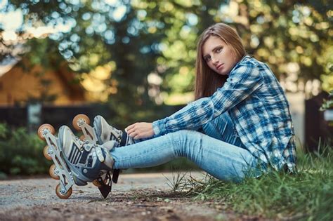 Premium Photo A Beautiful Woman In A Fleece Shirt And Jeans Resting