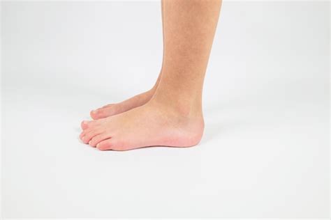 Premium Photo Side View Of The Feet On A White Background