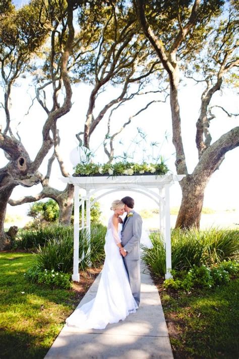 Feel the perfectly soft, white sand caressing your feet as you stroll through the palm trees, listening to the sound of the ocean waves combined with soft romantic music. Jekyll Island Wedding from Brooke Roberts Photography ...
