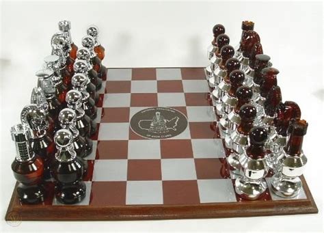 The actual chess board itself is the hard to find one with the 4 emblems in the middle. AVON CHESS SET AFTERSHAVE 32 BOTTLES DECANTERS BOARD NR ...