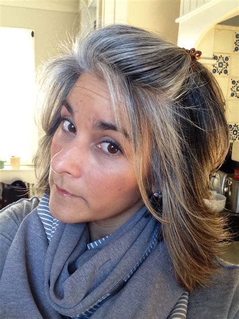 While selecting a lowlight color for grey hair, go for a relatively darker color like black, similar to natural hair. Nine months of grow-out. Salt & pepper roots blending with ...