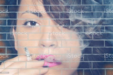 Close Up Portrait Of Beautiful Girl Smoking Cigarette With Cloud Of