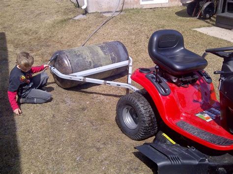 Load the seed into a spreader and apply it for the reseeding lawn work. Pull-Behind Lawn Roller | Lawn rollers, Diy lawn, Roller