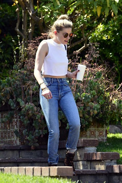 Amber Heard Shows Off Her Toned Midriff In A White Cropped Top As She Heads Out In Los Angeles
