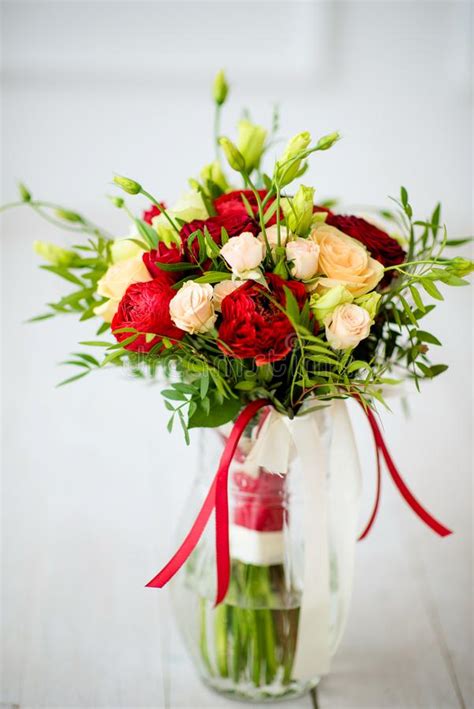Bridal Bouquet Of Red Roses With Red Satin Ribbons Stock Image Image