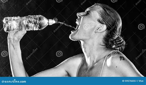 Thirsty Sporty Woman Drinking Water From A Bottle Stock Image Image Of Athletic Drinking