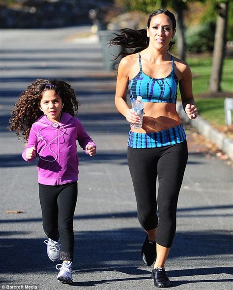 Melissa Gorga Flaunts Her Super Toned Stomach In A Crop Top And Leggings As She Goes For A Jog