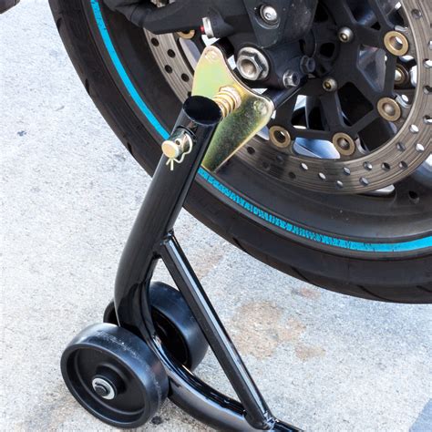 If you are storing your bike, due to cold weather the stand cannot offer many innovations; Black Motorcycle Stand Front and Rear Wheel Lift Paddock ...