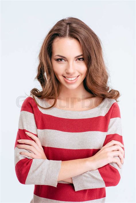 Happy Cute Woman Standing With Arms Folded Stock Image Colourbox