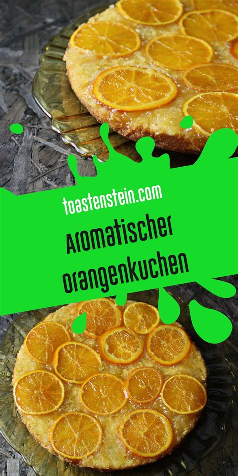 Two Orange Cakes On A Glass Plate With Green Lettering Over The Top That Says Aromatischer