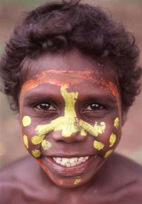 Smiling Aboriginal Boy With Tribal Face Paint Aboriginal People
