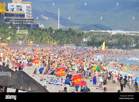 Tourists Crowd A Beach Resort During The Chinese Lunar New Year Holiday
