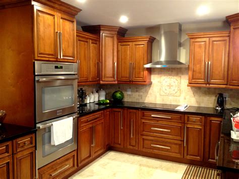 Some homeowners choose to stain their kitchen cabinets with a colored wood stain such as blue green or black. RTA Kitchen Cabinets Color Choices