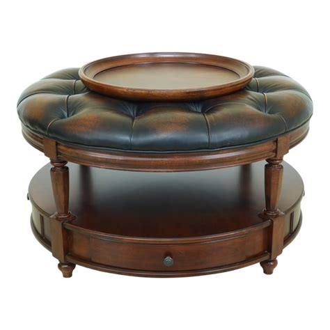 Round ottomans, just like round coffee tables the tufted top isn't flat so use a tray if you plan to serve drinks or snacks. Large Round Tufted Leather Ottoman Coffee Table | Chairish