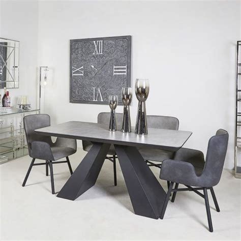 The mary sunshine diner chair can brighten up any room in your house. Axel Black And Grey Wooden Dining Table And 4 Grey Dining ...