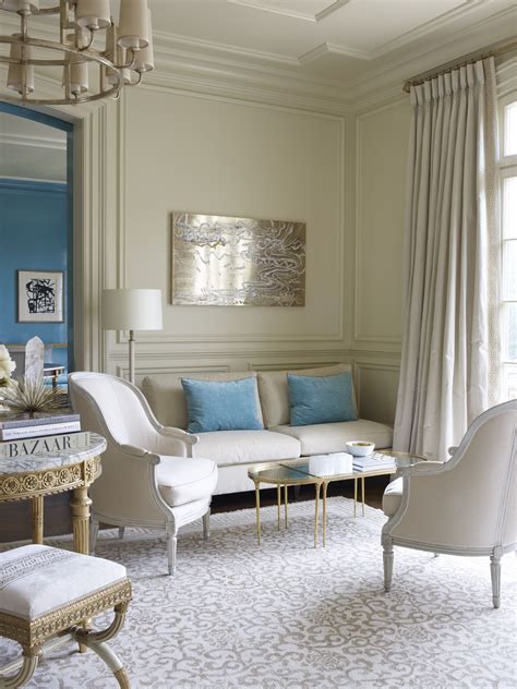 Chic Neutral Living Room With Pops Of Blue Neutral Living Room Living