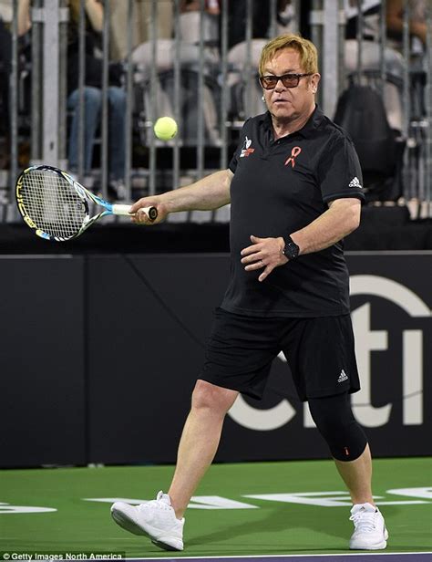 Elton John Looks Puffed Out As He Throws His All Into Charity Tennis
