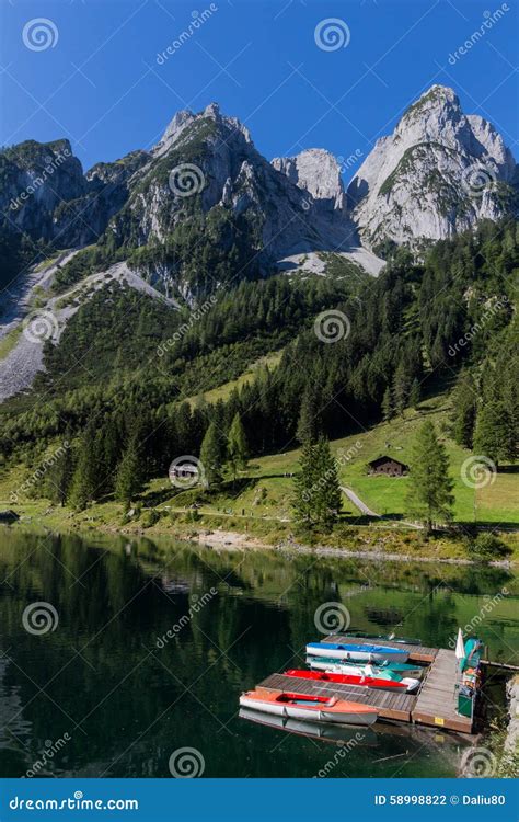 Beautiful Landscape Of Alpine Lake With Crystal Clear Green Water And