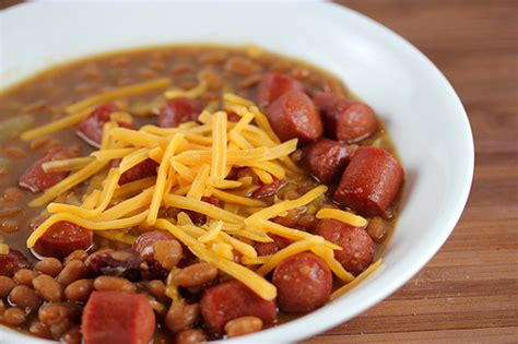 Take the humble hot dog to another level by using steak, complemented by melted cheese, fried green peppers and crispy onions. Simple Beans and Hotdogs Recipe