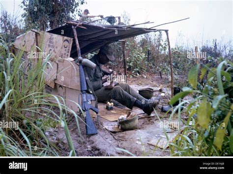 Vietnam War 1957 1975 American Soldier In A Improvised Hut Is Stock