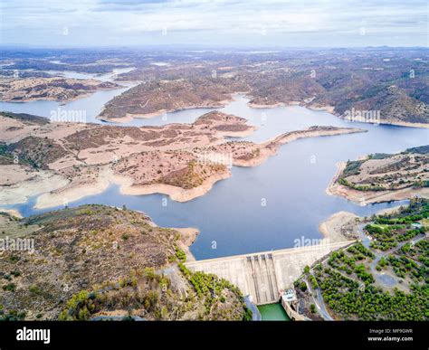 Alqueva Dam On Guadiana River In Hilly Alentejo Portugal Stock Photo