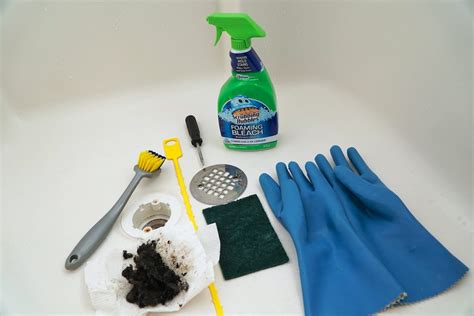 Pour a cup of baking soda down your drain. How To Unclog A Bathtub or Shower Drain From Hair