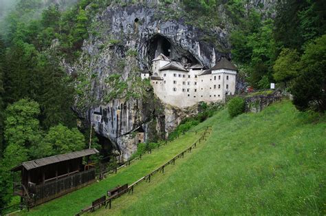 Predjama Castle In Slovenia Built Into The Mouth Of A Cave Rpics