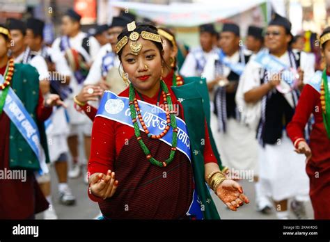 nepalese from ethnic gurung community in traditional attire dance while taking part in parade to
