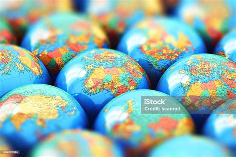 Small Earth Globes With World Maps Stock Photo Download Image Now