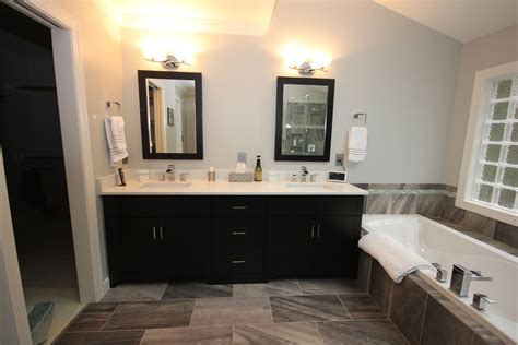 Want to have a look in our grooming cabinets? Dark Bath Cabinets by The Bath Remodeling Center, LLC