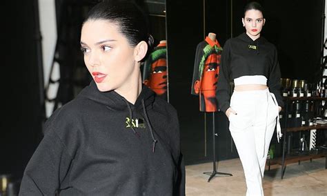 Kendall Jenner Flashes Her Trim Midriff In Sports Chic Inspired Look