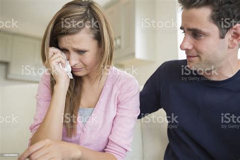Man Comforting His Crying Wife Stock Photo Download Image Now 20 29