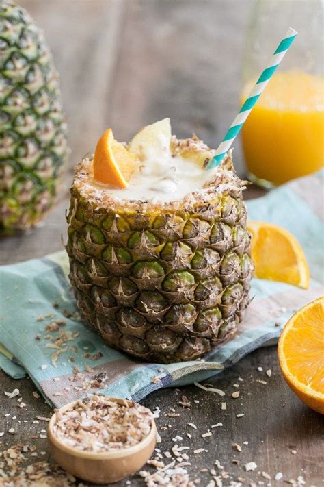 How To Make A Toasted Coconut Pineapple Cocktail In A Pineapple Cup