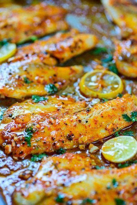 The keto diet may have plenty of restrictions (sorry, carbs and sugar), but with those limitations comes creativity. Spicy Lemon Garlic Baked Tilapia on a baking tray ...