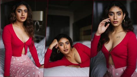 Priya Prakash Varrier Oozes Sex Appeal In Red Cleavage Revealing Top