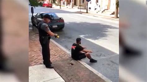 Cop Stun Guns Man Sitting On Sidewalk Cnn Video