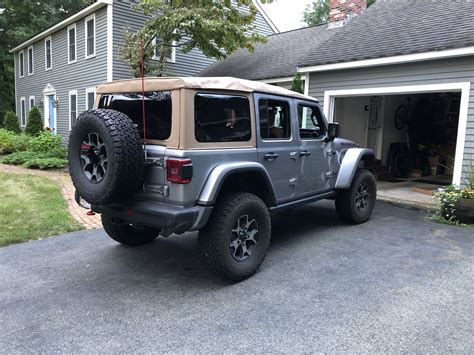 I believe the soft top comes with rails that can then be removed when you switch to the hard top. Didn't know you could order and receive the soft top ...