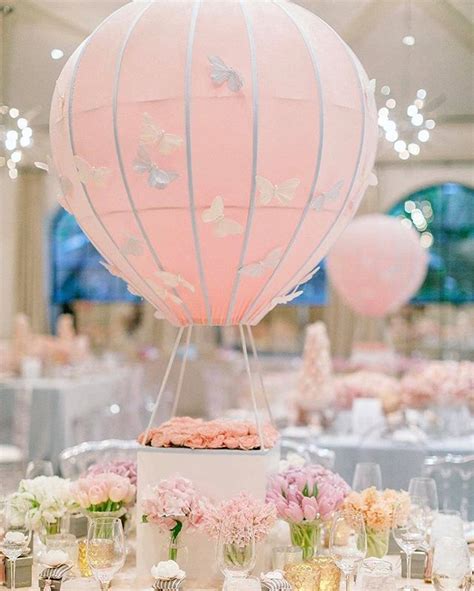 These Baby Pink Hot Air Balloons With Florals Surround The Base