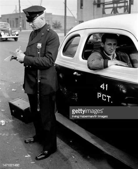 Police Officer Writing Ticket 1940s Photos And Premium High Res