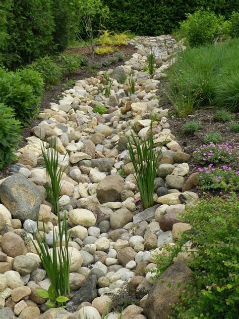 How To Install A Dry Creek Bed River Rock Landscaping Landscaping With Rocks Front Yard