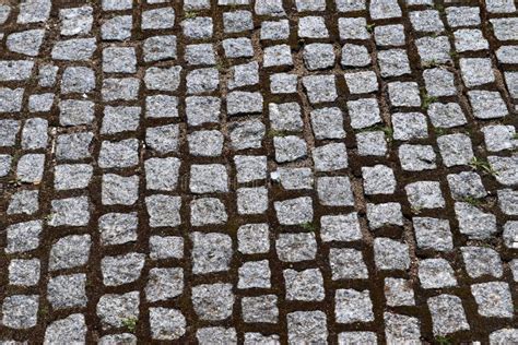 Close Up Detailed View On A Cobblestone Street Pavement In High