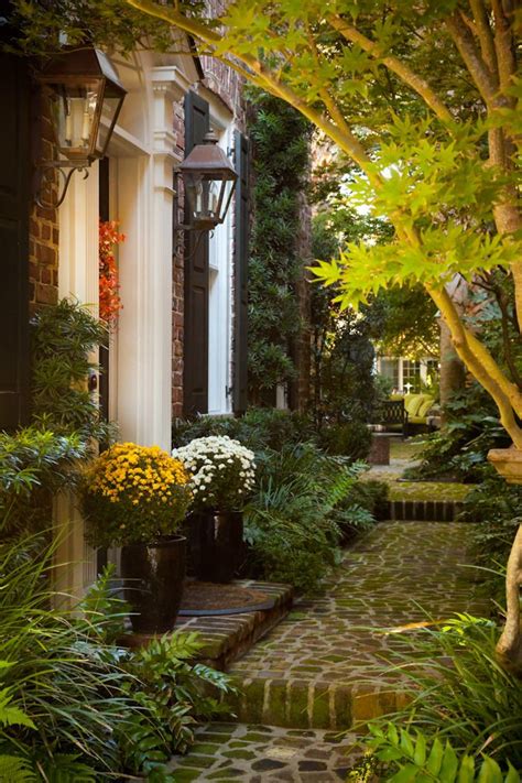 Splendor In The South Autumn Courtyard With Mums Charleston Sc
