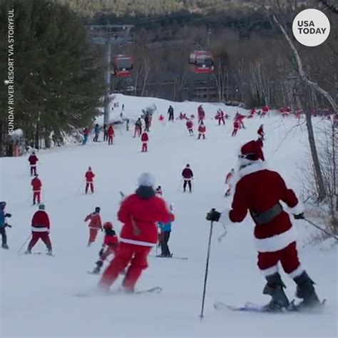 Skiing Santas Hit The Slopes For A Good Cause Ho Ho Ho Skiing Santas Fly Down The Slopes