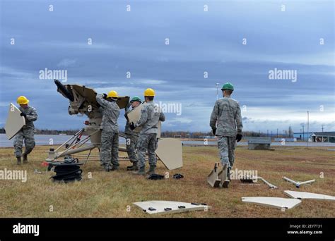 Us Airmen With The 52nd Combat Communications Squadron Work Together