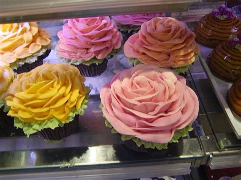 Cupcake has launched a line of cupcakes at whole foods market stores right across the uk. Rose cupcakes | Rose cupcakes, Flower cupcakes, Whole food ...