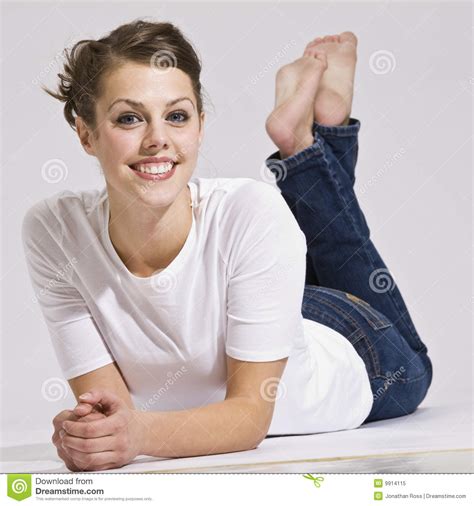 See full list on grammarhow.com Attractive Woman Lying Down And Smiling Royalty Free Stock ...
