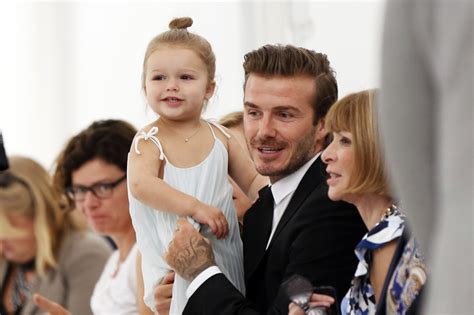 Dad david beckham, 45, posted an victoria beckham shared pictures of her family filled 'frow' at lfw in september and tagged her. Family Cam: Daddy David Beckham squashes Harper ...