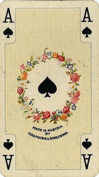 An Ace Playing Card With Roses And Leaves On The Front Surrounded By