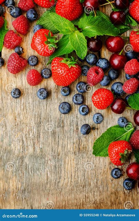 Wood Background With Fresh Berries Strawberries Blueberries C Stock